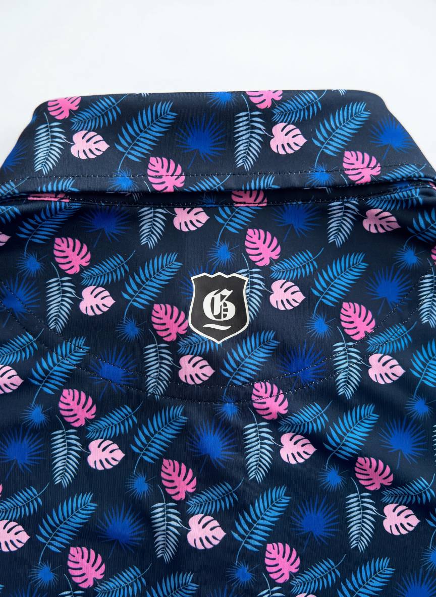 Men's Havana Jungle Polo from Tropical Dawn Collection featuring tropical print fabric and classic polo design.