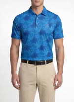 Men's Poolside Paradise Polo by Caribbean Collection featuring a blue casual polo shirt with a relaxed fit and tropical-inspired design.