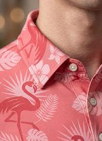 Men's Flamingo Sunset Polo from Caribbean Collection featuring coral and flamingo print, classic polo style.