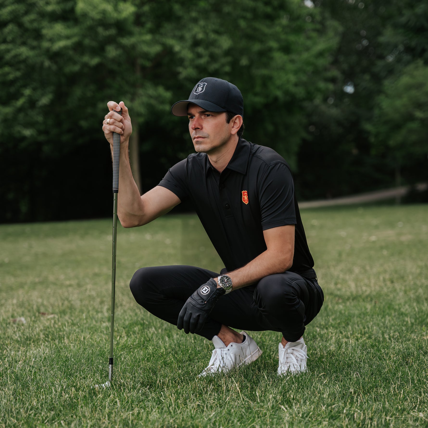 Black men's tournament cap from the Originals Collection, stylish men's hat with adjustable fit and classic design.