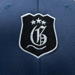 Navy men's Ace Cap from Originals Collection featuring a classic baseball style and adjustable strap.