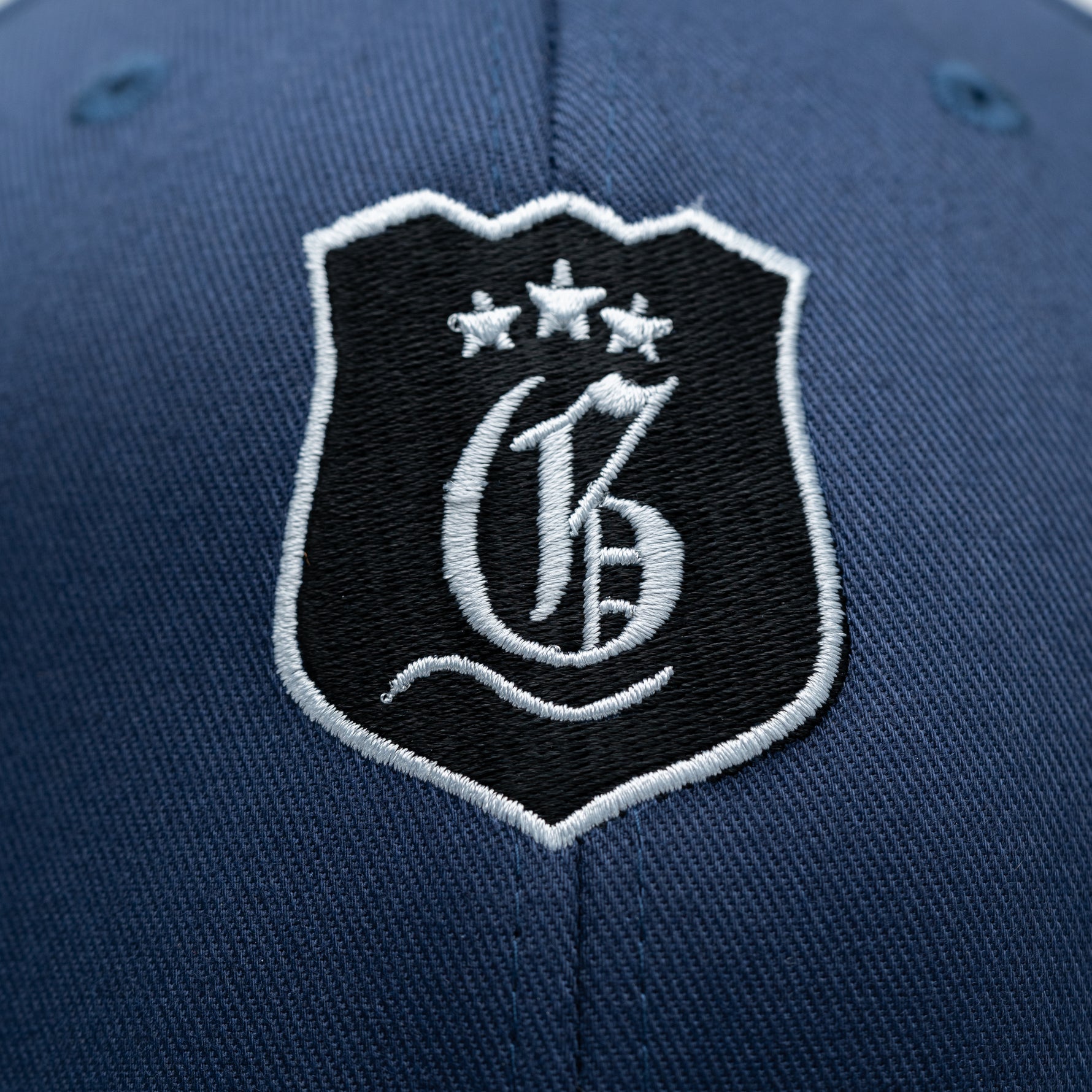 Navy men's Ace Cap from Originals Collection featuring a classic baseball style and adjustable strap.